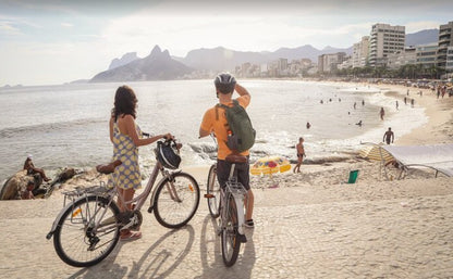 Cycle through the best sunset in Rio
