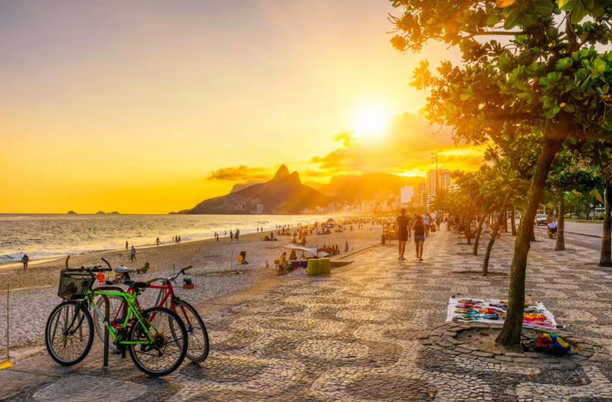 Cycle through the best sunset in Rio