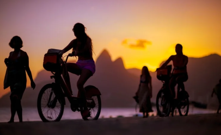 Cycle through the best sunset in Rio